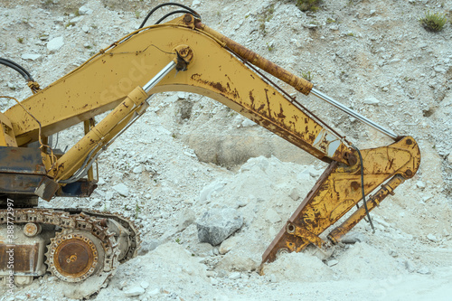 rusty digger leverages at marble quarry, Carrara, Italy