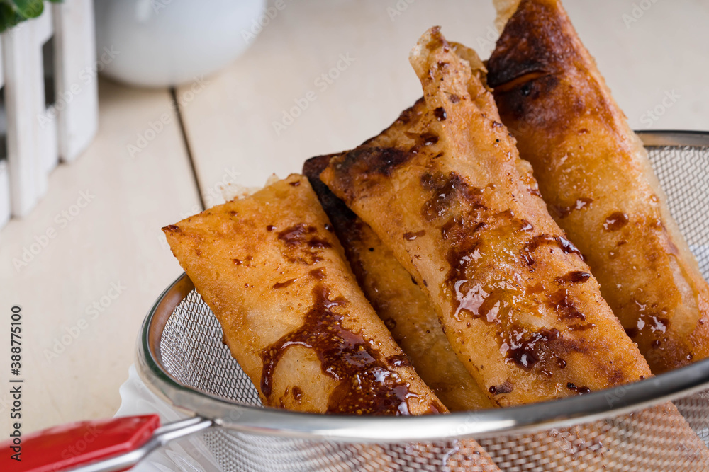banana with jackfruit in rice wrapped also known as turon in the Philippines Stock Photo Adobe