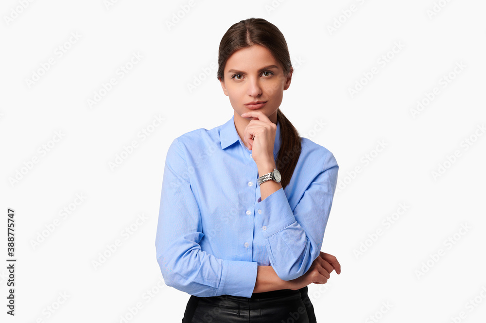 Pensive businesswoman in blue shirt on white isolated background Pensive businesswoman in blue shirt on white isolated background