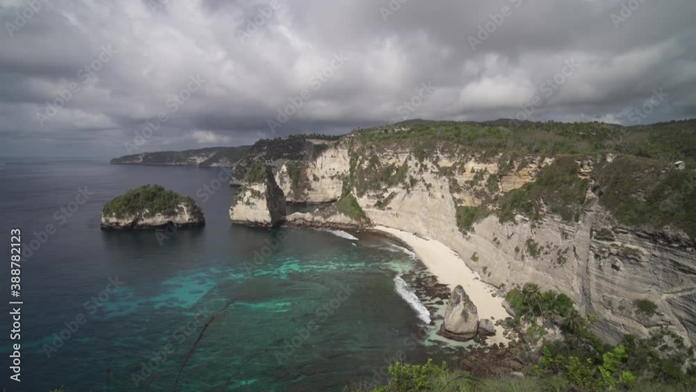 Bali Nusa Penida Indonesia - Diamond Beach - Crystal Clear Blue Water with White Rock Cliff - Popular Tourist Travel Destination Beautiful Nature Landscape Bali Nusa Penida Indonesia - Diamond Beach - Crystal Clear Blue Water with White Rock Cliff - Popular Tourist Travel Destination Beautiful Nature Landscape
