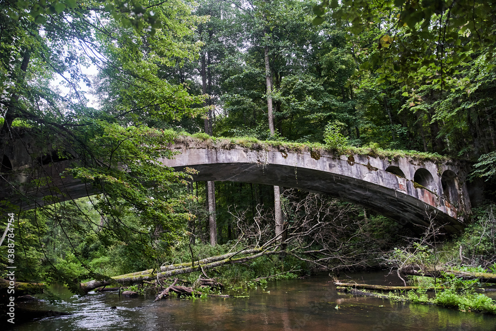 Old German bridge. The bridge of the Rominten Forest. Vishtynetskoe lake. Kaliningrad region. Old German bridge. The bridge of the Rominten Forest. Vishtynetskoe lake. Kaliningrad region.
