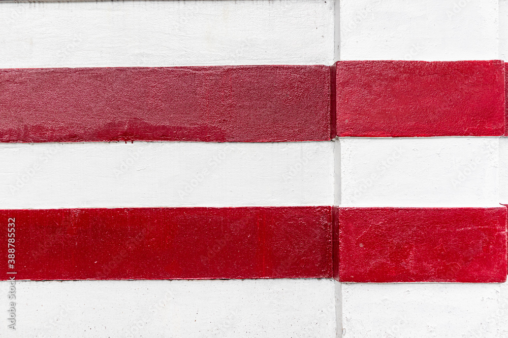White and red concrete wall in the city. White and red concrete wall in the city.