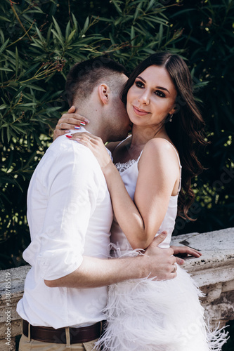 Wallpaper Mural The love story of a guy and a girl on the city streets. Young people travel. Summer walk around the city. Torontodigital.ca