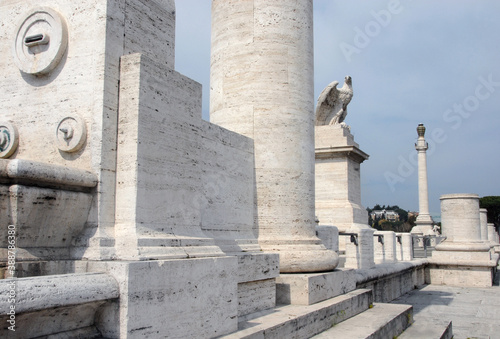 Ponte Flaminio is a bridge over the Tiber in rationalist architecture adorned with sculptures and travertine columns. photo