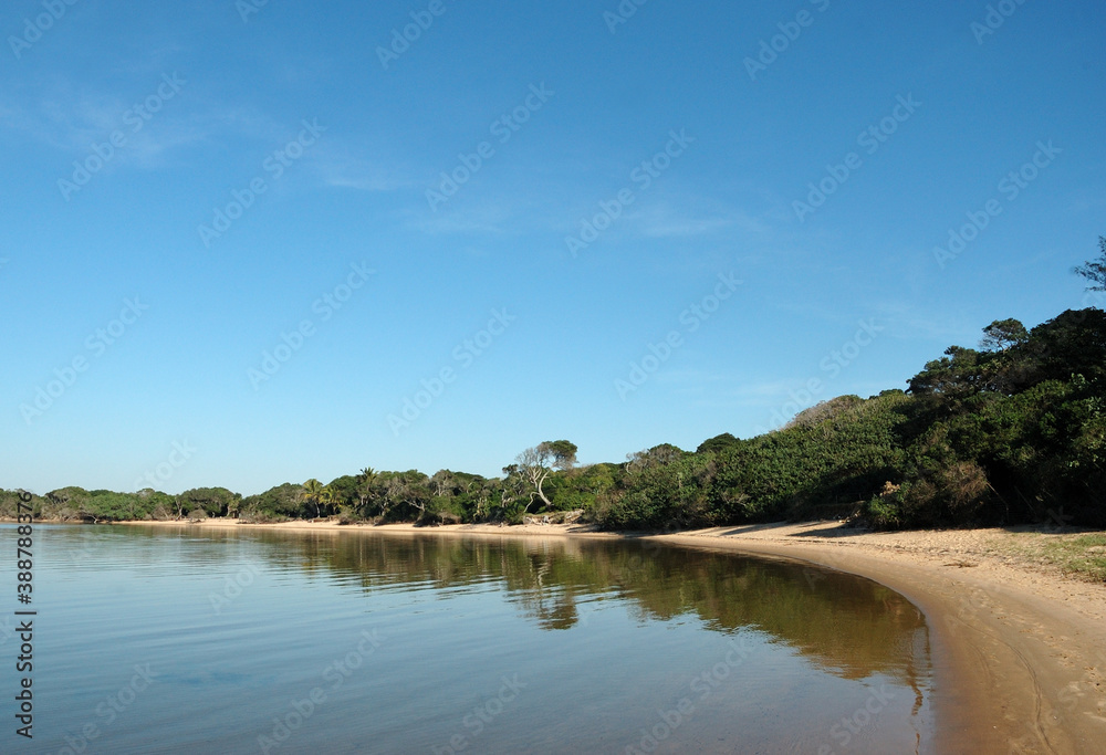 An endless beach on the shore of Lake Four at Kosi Bay in Kwazulu-Natal - obrazy, fototapety, plakaty 