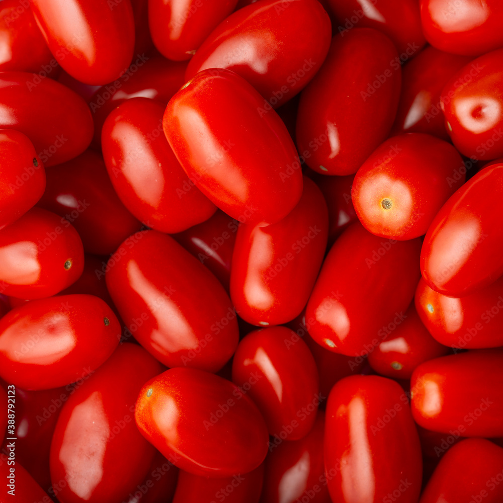 Red ripen cherry tomatoes. Pattern, top view, macro shot. Red ripen cherry tomatoes. Pattern, top view, macro shot.