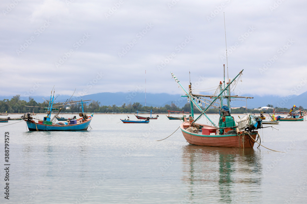 The small motorboat stop on the sea