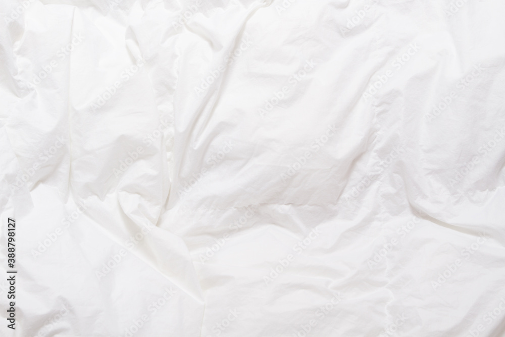Top view of bedding sheets crease, white blanket texture. Close up of bedding sheets with copy-space