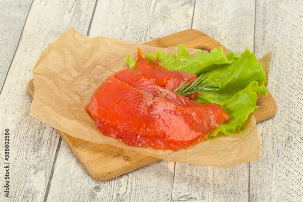 Sliced salmon fillet served rosemary Sliced salmon fillet served rosemary