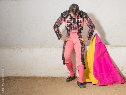 seated bullfighter waiting and concentrated