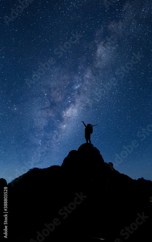 a girl staring at the milky way