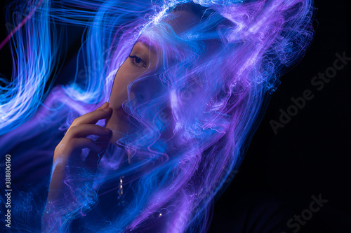 Portrait in the style of light painting. Long exposure photo