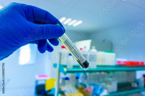 laboratory specialized in analysis of coronavirus, antibodies, covid vaccine, technician in analysis, machinery for covid-19, test tubes, surgical mask, work, autoclave machine, centrifugal machine