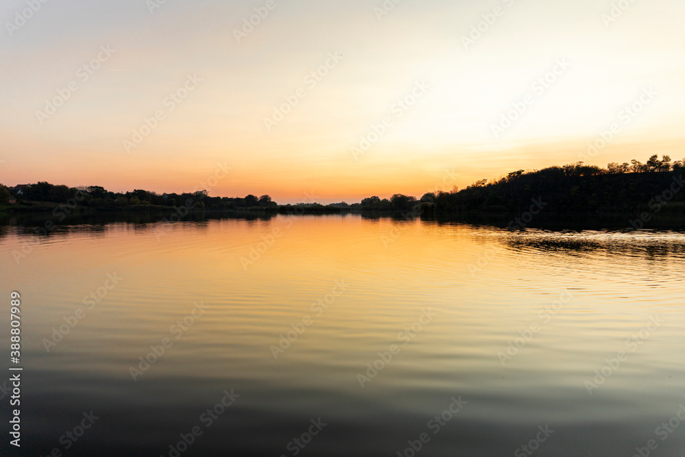 Lake at sunset. Landscape and nature