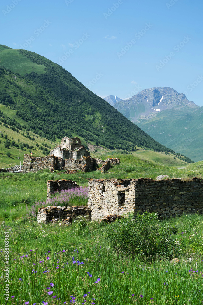 Ruins on the mountains of North Ossetia. The mountains of the North Caucasus in the summer Ruins on the mountains of North Ossetia. The mountains of the North Caucasus in the summer