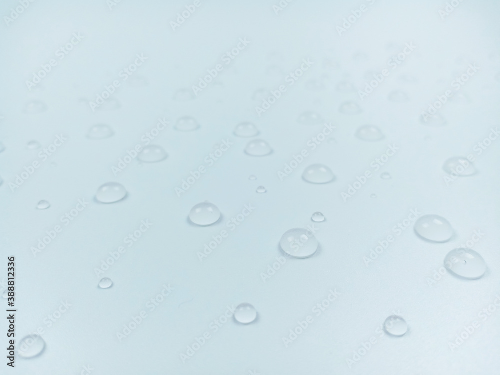 Clear water drops on white background.