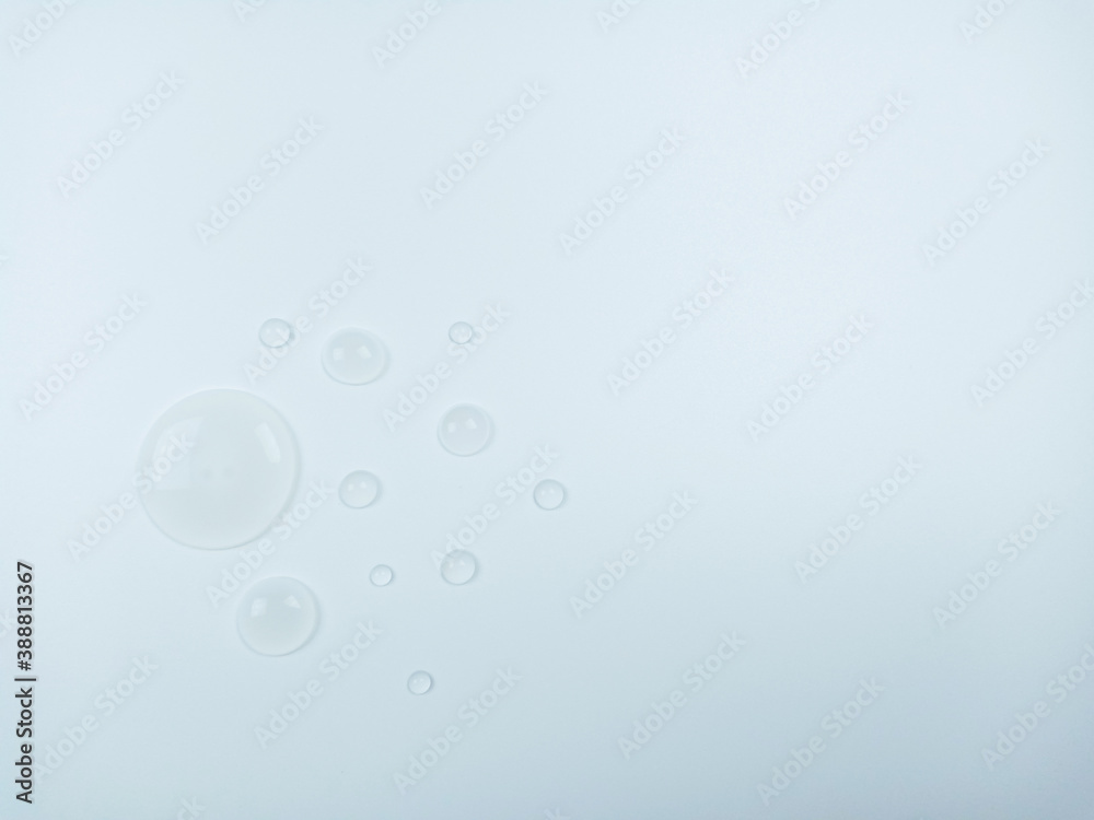 Clear water drops on white background with free copy space. Clear water drops on white background with free copy space.