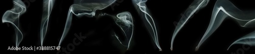 Set or collection of different eight abstract white motion smokes on black background.