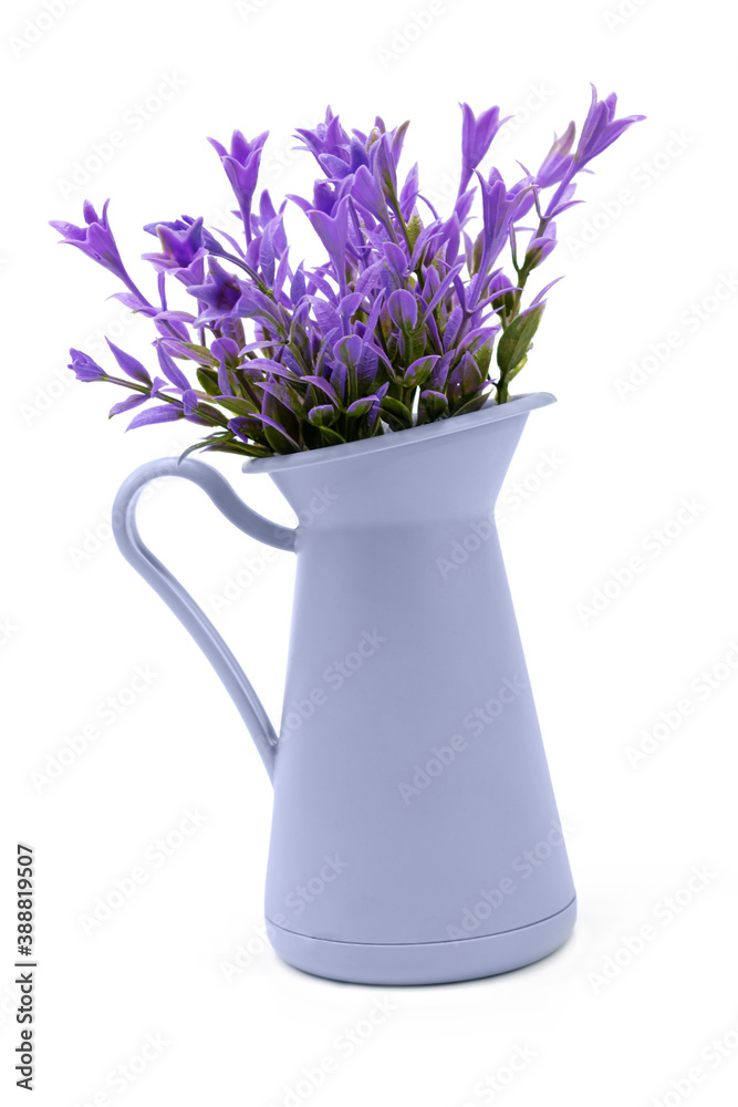 Artificial purple flowers in decorative plastic vase