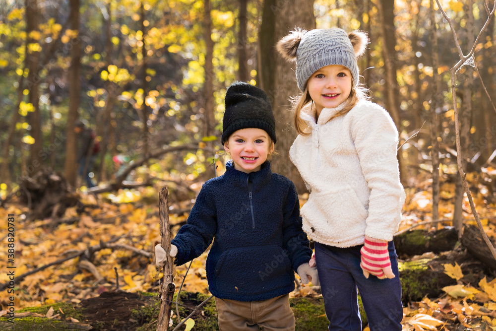 cute caucasian kids on fall season outdoors cute caucasian kids on fall season outdoors