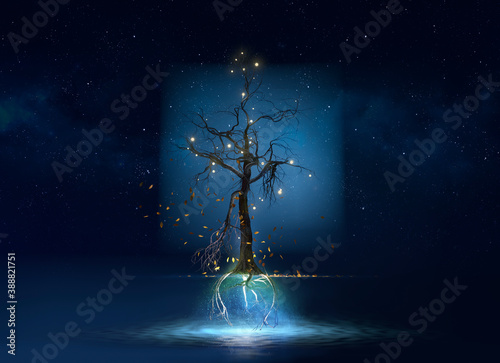 Mysterious illuminated floating tree above water photo
