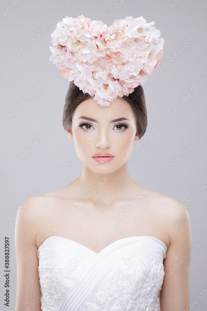 Front beauty portrait. Beautiful female model with spring flowers. Beauty Face. Creative Make up and Hair Style. Front beauty portrait. Beautiful female model with spring flowers. Beauty Face. Creative Make up and Hair Style.