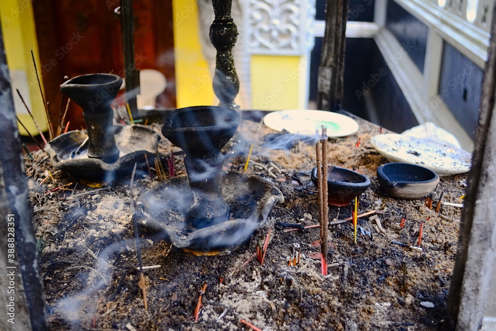 Burning incense sticks on stick pot with ashes and smoke, use for pray