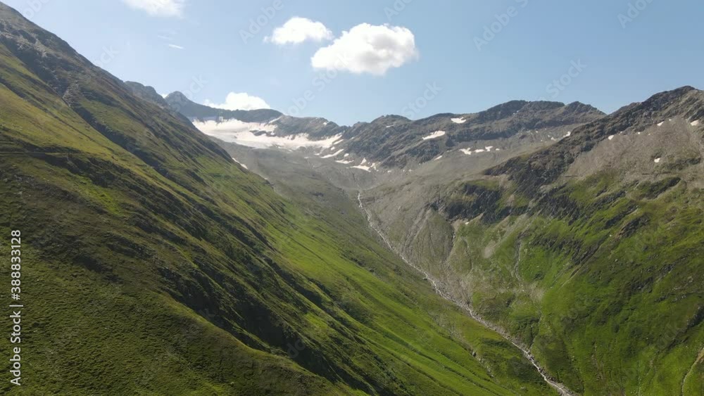 Shrinking Mutt glacier as seen from Furka pass in Switzerland Shrinking Mutt glacier as seen from Furka pass in Switzerland
