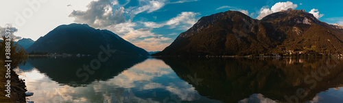High resolution stitched panorama of a beautiful alpine sunset view with reflections at the famous Achensee, Pertisau, Tyrol, Austria © Martin Erdniss