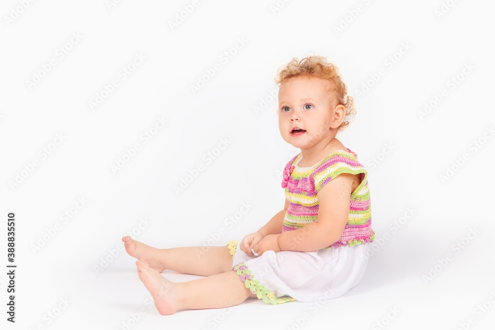 little girl with curly hair on a light background little girl with curly hair on a light background