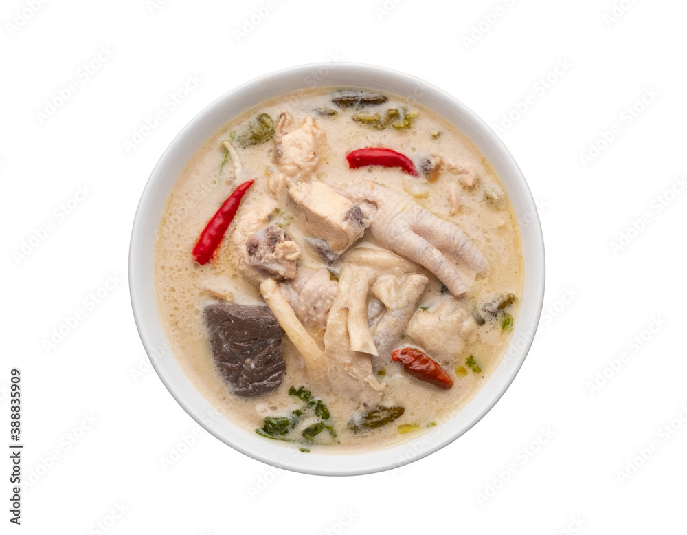 Thai Chicken Coconut Soup.Boiled chicken feet and blood jelly with Galangal, lemon grass, Kaffir lime leaves in coconut milk (Tom Kha Gai).Top view isolated on white background with Clipping Path