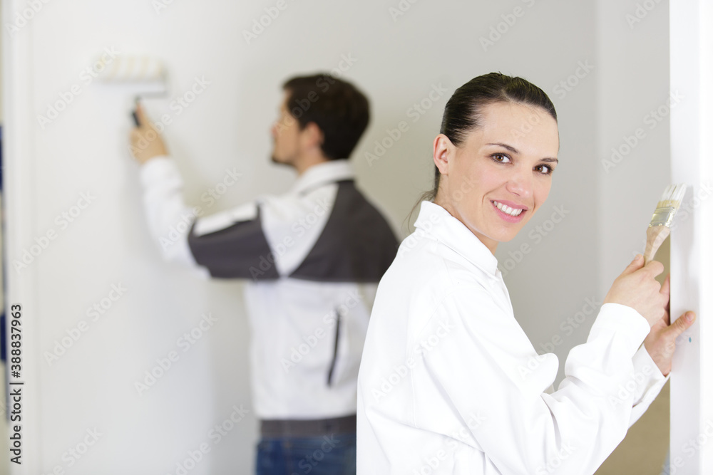 Fototapeta premium a woman is renovating a house