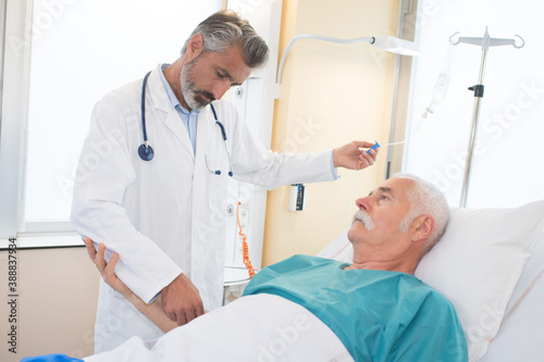a doctor assisting senior patient