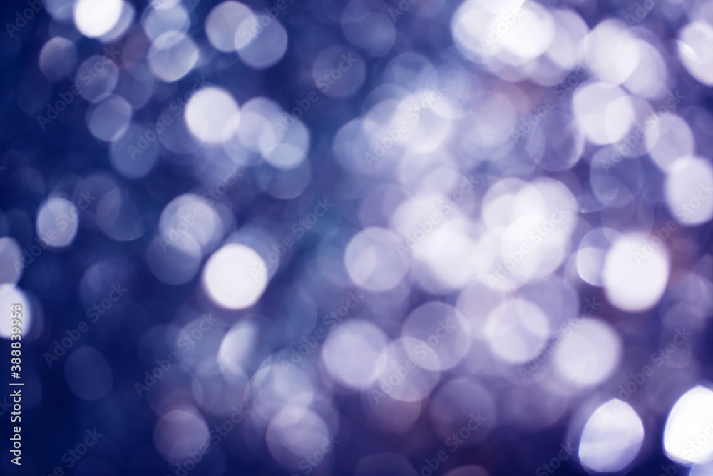 Abstract blue-violet background with bokeh. Holiday Christmas and New Year. Template for design. Magic concept. Abstract blue-violet background with bokeh. Holiday Christmas and New Year. Template for design. Magic concept.