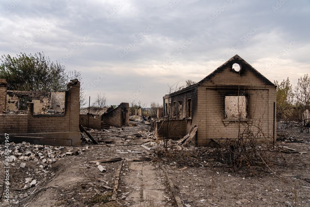 Dramatic landscape in the village after the fire Dramatic landscape in the village after the fire