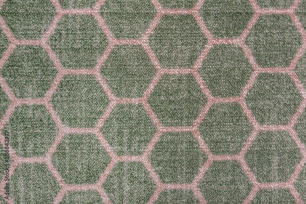 abstract background of green carpet with honeycomb pattern texture close up abstract background of green carpet with honeycomb pattern texture close up