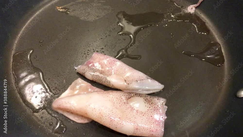 Close up, squid being grilled, as part of a tasty and healthy diet, 4k Close up, squid being grilled, as part of a tasty and healthy diet, 4k