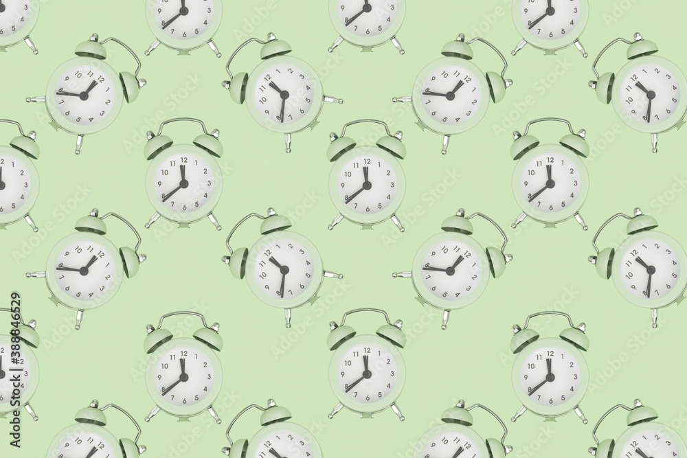 Background from alarm clocks. Antique alarm clocks. Pattern. Top view. Background from alarm clocks. Antique alarm clocks. Pattern. Top view.