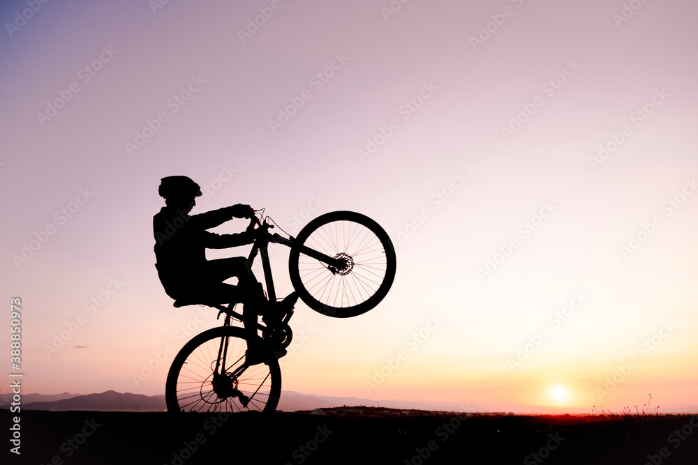 Fototapeta premium unusual riding techniques for the active and energetic cyclist