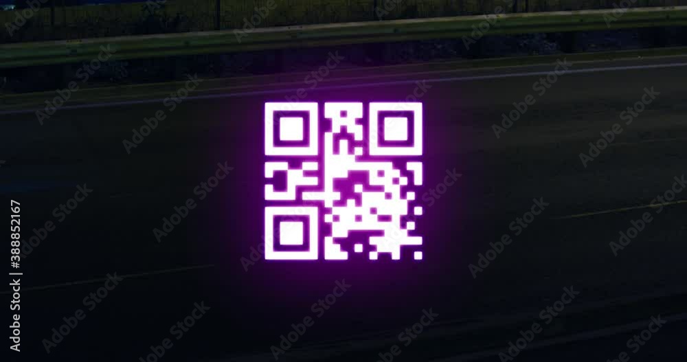 QR code scanner against light trails on black background QR code scanner against light trails on black background