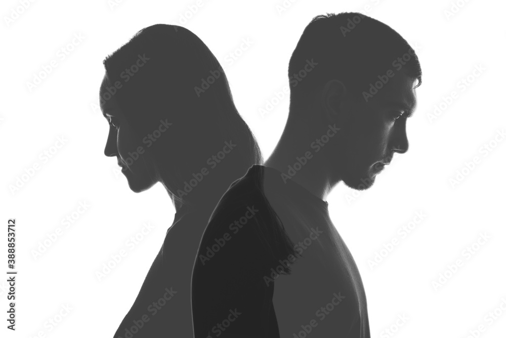 multi exposure black and white silhouettes of portraits men and women on white background. Divorce concept