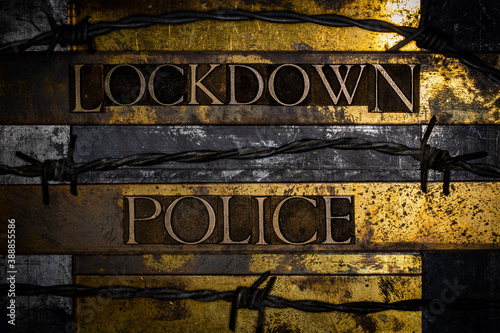 Φωτογραφία Lockdown Police text message on textured grunge copper and vintage gold backgrou