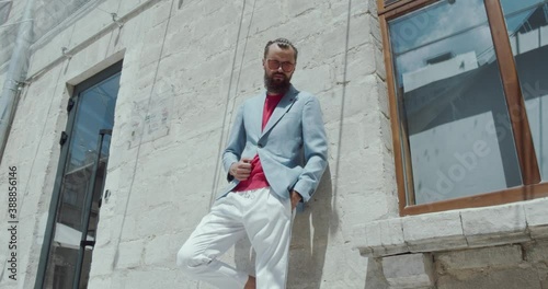 Wallpaper Mural Young serious man, wearing a vouge style of clothes Torontodigital.ca