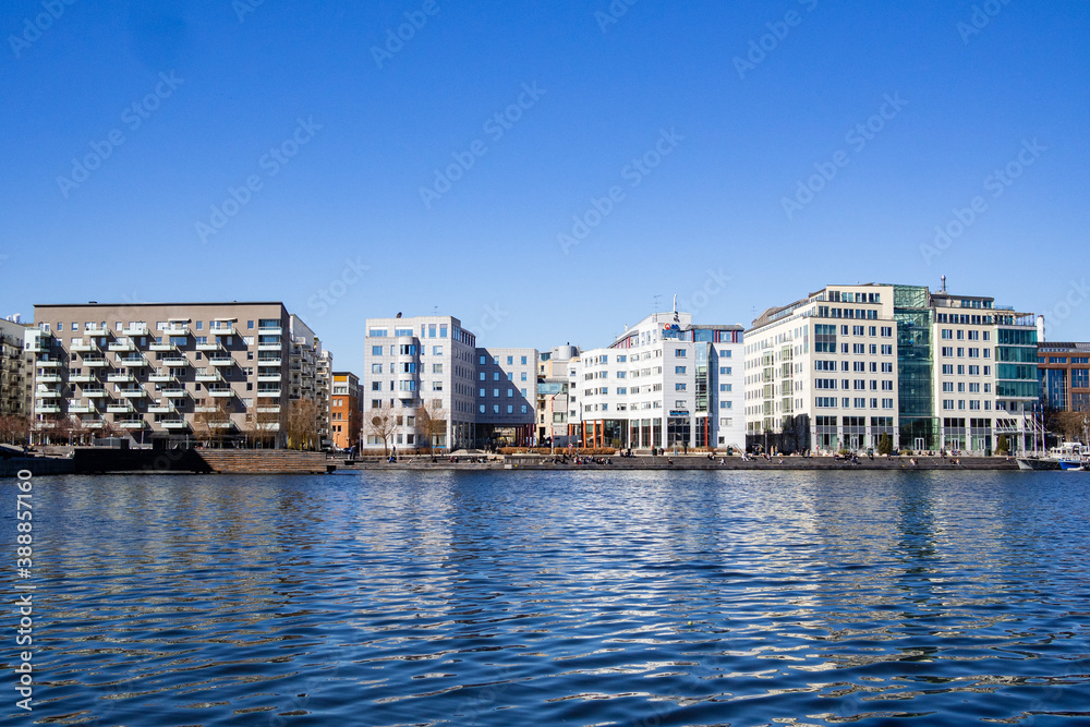 Stockholm, Sweden - April 17 2019 : Office buildings by the waterfront in Marievik - obrazy, fototapety, plakaty 