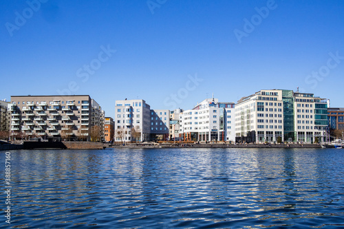 Wallpaper Mural Stockholm, Sweden - April 17 2019 : Office buildings by the waterfront in Mariev