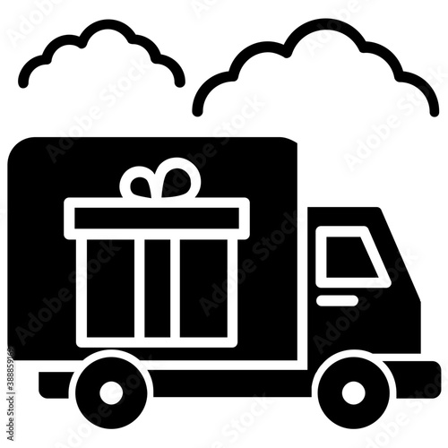 An icon showing van wanding on a road and designed with gift package, good icon for delivery services 
