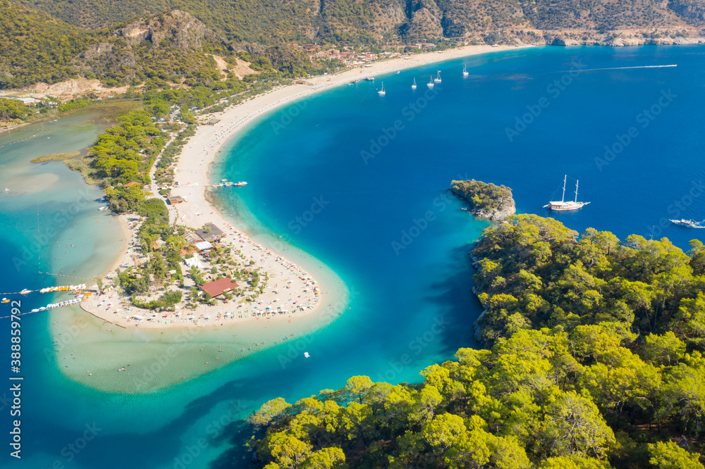 aerial view to curved coast and long sand beach near Fethie city in Turkey  - obrazy, fototapety, plakaty 