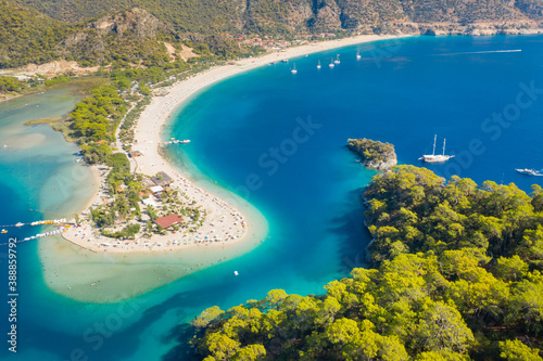 aerial view to curved coast and long sand beach near Fethie city in Turkey 