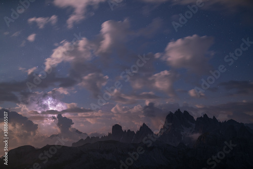 storm over mountains in dolomites