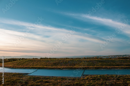 Beautiful sunset landscape with blue sky and white clouds